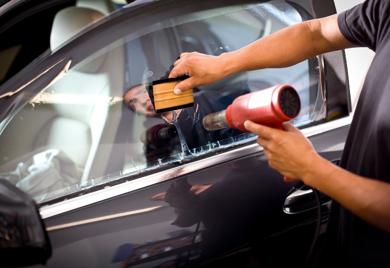 Car Getting Its Windows Tinted at Auto Salon of Orlando